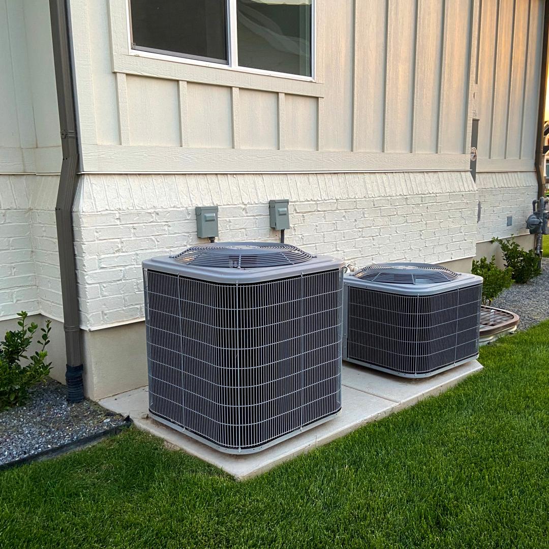 two outdoor ac condensers